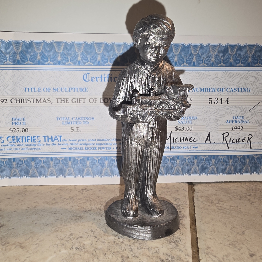Silver Sculpture with Historical Elegance